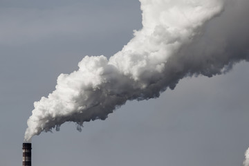 Smoke from the pipes of the factory