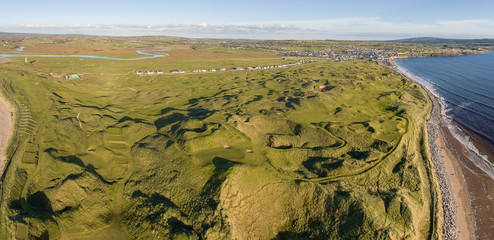 scenic aerial birds eye panoramic irish landscape from lahinch in county clare, ireland. beautiful lahinch beach and golf course along the wild atlantic way - 225527437