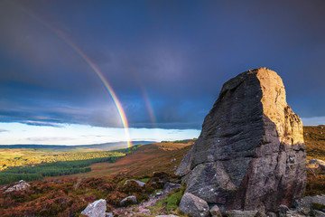 Rainbow at Drake Stone / The Drake Stone at Harbottle in Northumberland is a huge 30 feet tall sandstone boulder reputed to have special healing powers