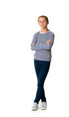 Young teen girl standing on white background