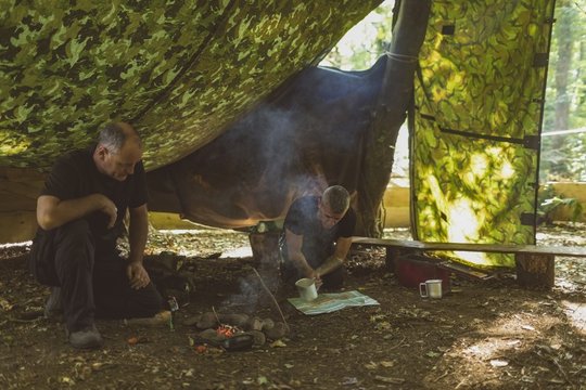 Man looking at map in boot camp