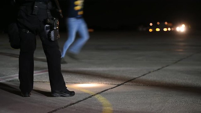 Night scene with special forces showing their skills in a simulated hostage rescue drill