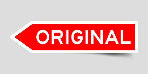 Red color arrow label sticker with word original on gray background