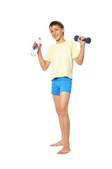 Fototapeta na wymiar Young boy with dumbbell and bottle of water
