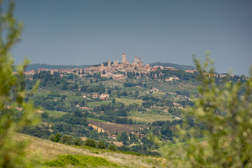 Fototapeta na wymiar View of San Gimignano in Tuscany from a distance; several of the 14 remaining towers can clearly be seen.