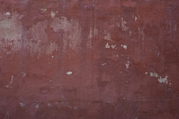 reddish wall with white hides