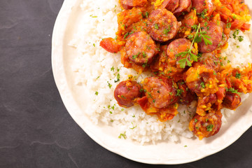 sausage with tomato sauce and rice
