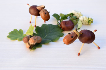 Animal figurines made of chestnuts and acorns