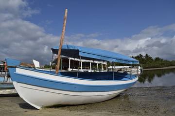 canoe and fishing boat, island of Boipeba, Cairu, Bahia, Brazil