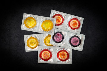 Concept for healthcare - Close up shot of various Colorful condoms