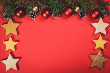 Christmas and New Year holidays. background. Christmas card with copy space. Stylish branding mockup to display your artworks. Cute vintage christmas new year gifts mock up on red background.