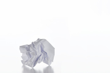 White crumpled paper on white background
