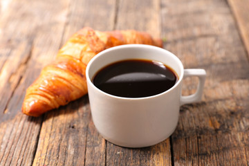 coffee cup and croissant