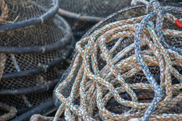 colored used ship ropes at the harbor