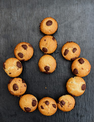 Chocolate chip muffins with power icon shape.