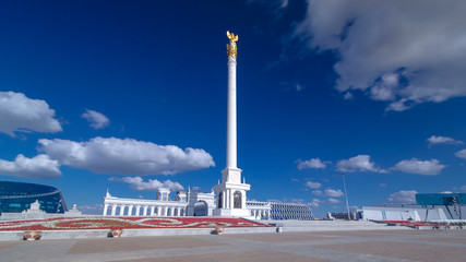 Fototapeta na wymiar View of the Kazakh Eli Monument timelapse hyperlapse on Independence Square in Astana, the capital of Kazakhstan.
