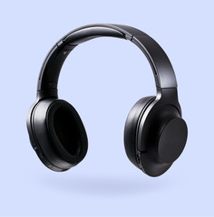 Black bluetooth headphones on a light background