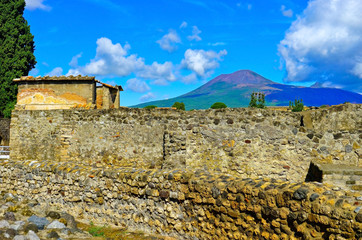View of the roman ruins destroyed by the eruption of Mount Vesuvius centuries ago at Pompeii Archaeological Park in Pompei, Italy.