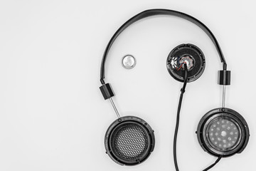 Broken earphones isolated on white background, Do it yourself or how to fix broken headphones concepts.