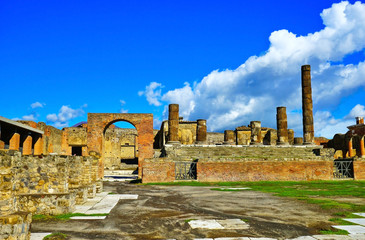Fototapeta na wymiar View of the roman ruins destroyed by the eruption of Mount Vesuvius centuries ago at Pompeii Archaeological Park in Pompei, Italy.