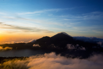 Fototapeta na wymiar Sunrise on top of Batur volcano in Bali