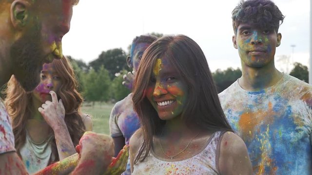 Group of friends playing with holi colors, video concepts about friendship and lifestyle