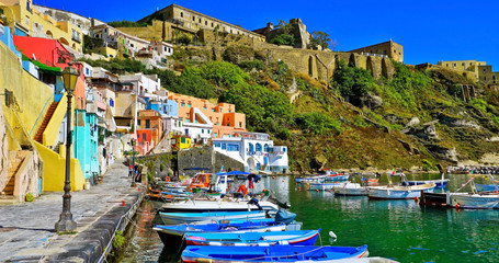 View of the colorful houses at the Port of Corricella in Procida Island, Italy.