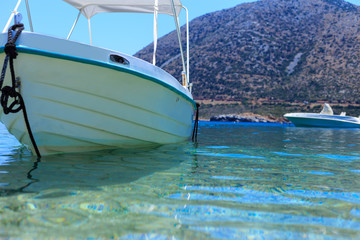 Fototapeta premium Fishing boat in the harbor of the Mediterranean close-up. Greece, Crete, Bali.