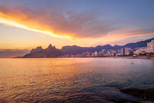 Rio de Janeiro skyline and Two Brothers (Dois Irmaos) Mountain at sunset - Rio de Janeiro, Brazil