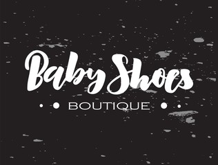 Hand lettering Baby Shoes boutique on chalkboard. Modern Calligraphy