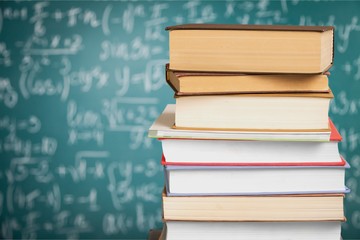 Row of of colorful books on  background
