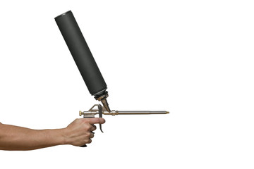 Worker hand holding polyurethane expanding foam glue gun applicator. Hand Spray foam gun worker hand isolated white background