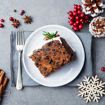 Christmas Fruit Cake, Pudding On White Plate. Copy Space. Top View.