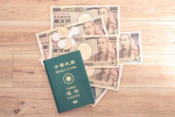 Japanese yen banknotes, Japanese yen coin and ROC Taiwan passports