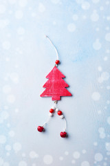 Christmas, New Year tree decoration on light blue background. Top view. Copy space.