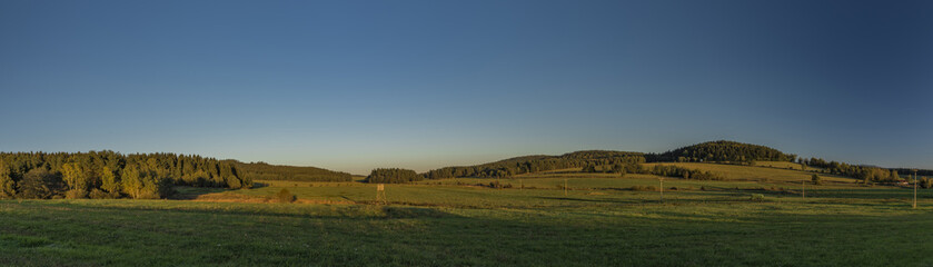Fototapeta na wymiar Meadows and forest in Sumava national park near Zbytiny village