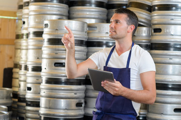 Worker counting barrels