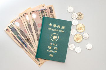 Japanese yen banknotes, Japanese yen coin and ROC Taiwan passports