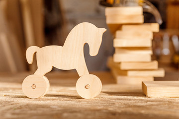wooden toy in carpenter workshop