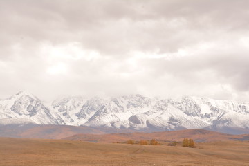 mountains landscape nature landscape view sky air oxygen autumn season grass trees blue yellow sand stone gray brown ridge water river rocks rock blue Altai,Russia open space