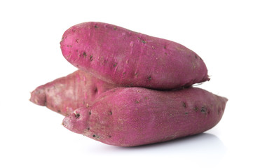 Fresh purple cassava isolated on white