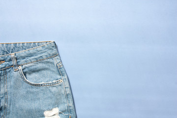 Jeans on a blue background. Blue palette