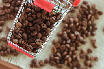 Studio photo of coffee beans in a grocery trolley