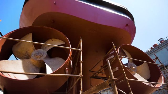 Ship Under Repair in Floating Dock . Overhaul and Modernization of Ships . View of the Repaired Propeller