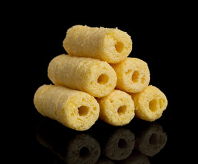 Corn sticks on a black background