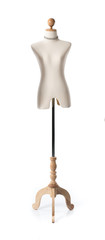 Female mannequin for a tailor on a wooden rack isolated on white background