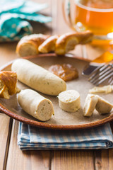 The bavarian weisswurst, pretzel and mustard.