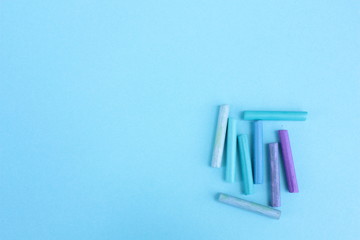 Colored pastel on a blue background