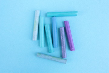 Colored pastel on a blue background