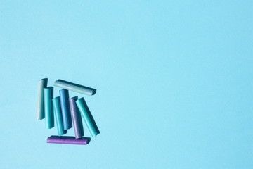 Colored pastel on a blue background